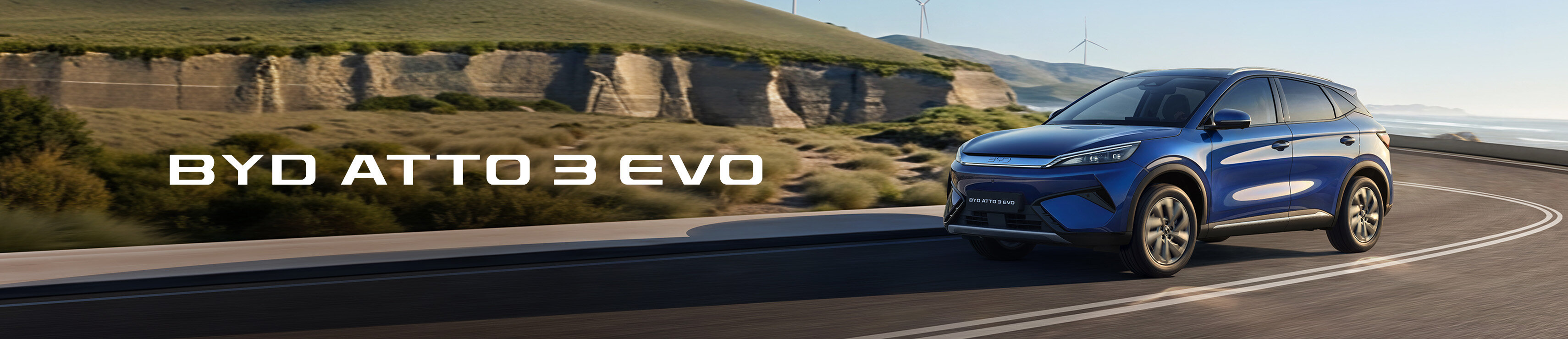 BYD ATTO 3 EVO con molinos de viento de fondo