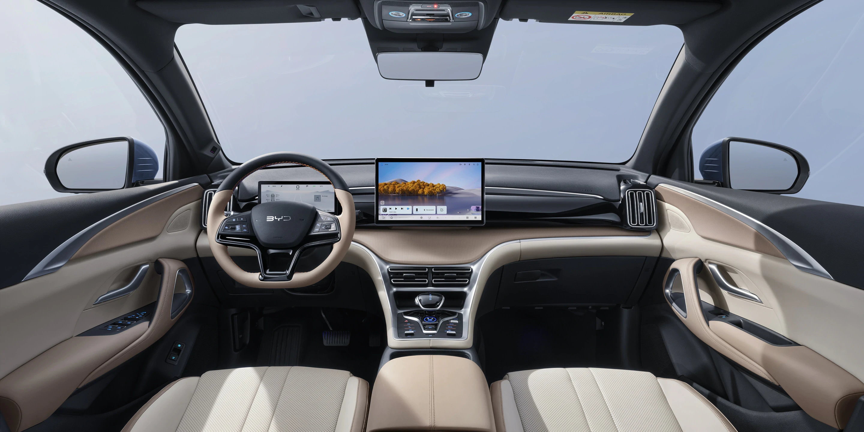 BYD Sealion 5 DM-i interior dashboard with 12.8-inch touchscreen, 8.8-inch digital instrument cluster, and floating center console