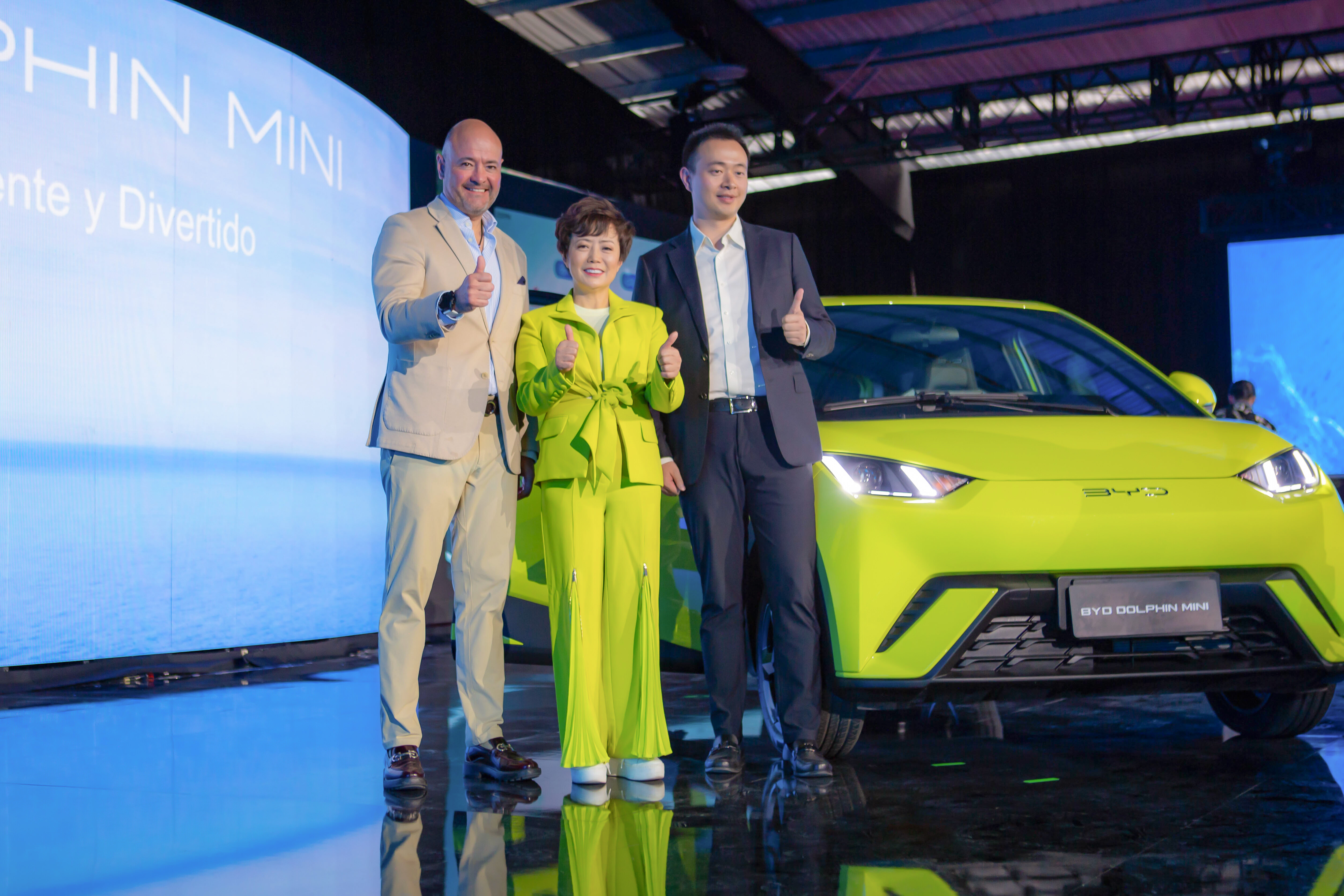 BYD Mexico's Jorge Vallejo, Ray Zhou, and BYD CEO of BYD Americas Stella Li with the BYD DOLPHIN MINI